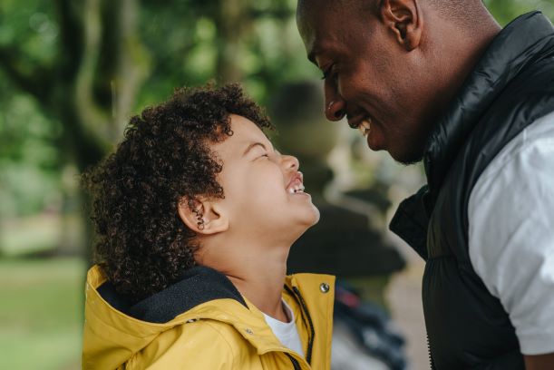 Photo of father and young son